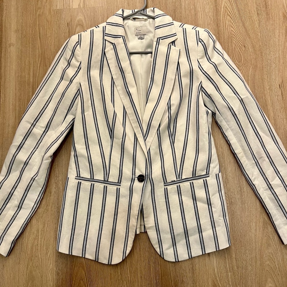 White and blue blazer
